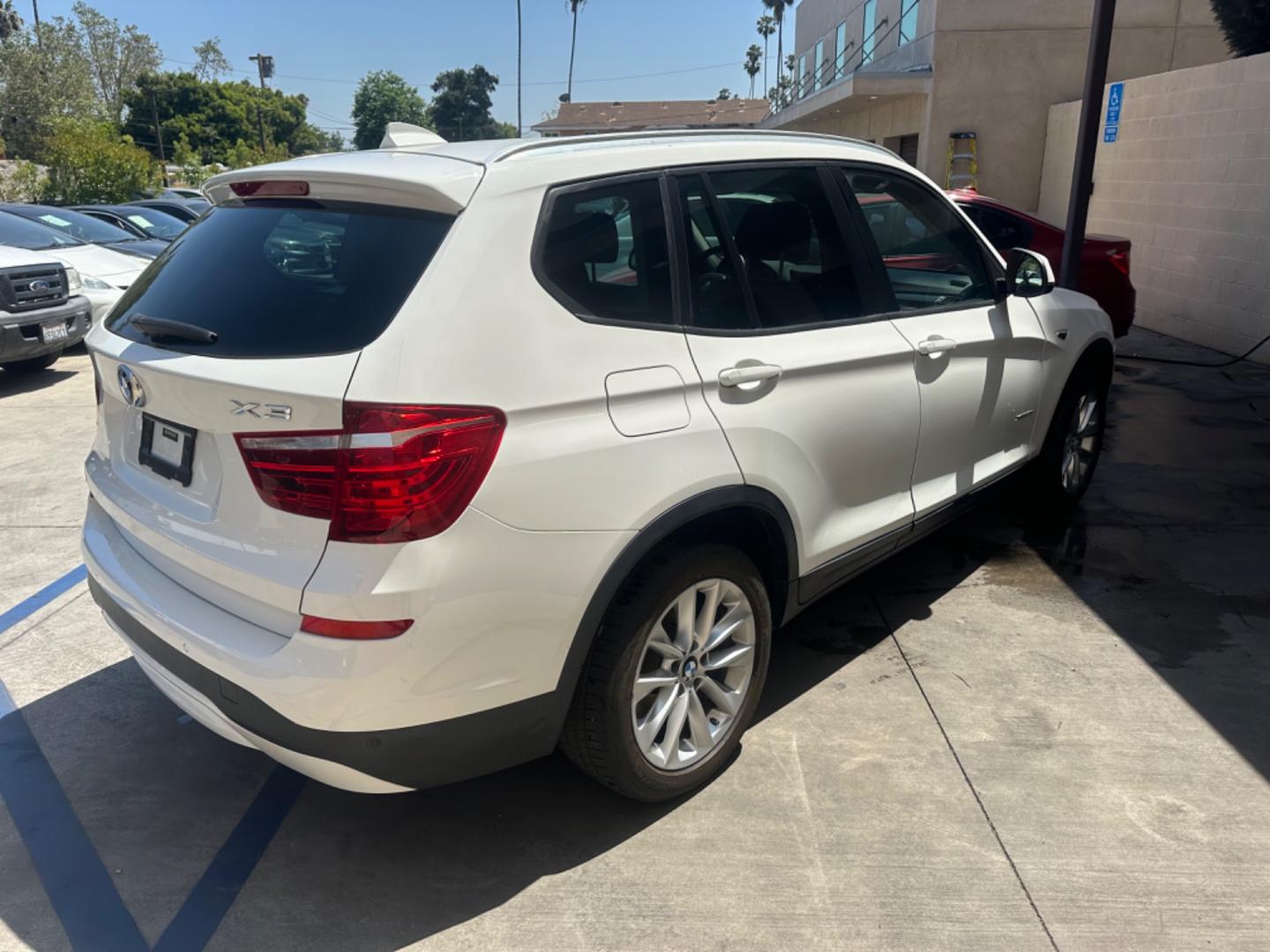 2017 WHITE /BLACK BMW X3 (5UXWX9C37H0) , located at 30 S. Berkeley Avenue, Pasadena, CA, 91107, (626) 248-7567, 34.145447, -118.109398 - Crown City Motors is a used “Buy Here Pay Here” car dealer in Pasadena CA. “Buy Here Pay Here” financing, means that when you purchase your vehicle from our dealership, that you make the payments to the dealership as well. We do not need the banks approval to get you approved for a used auto - Photo#4